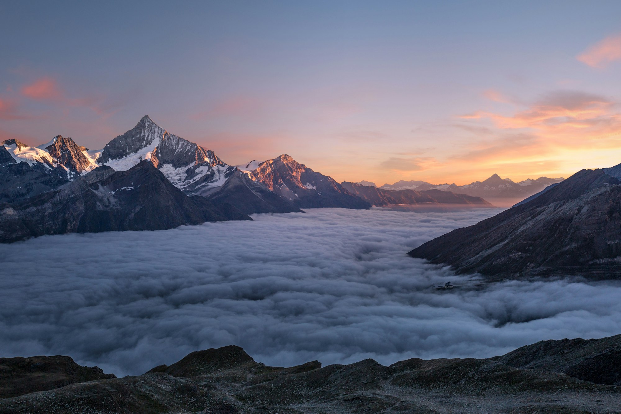 A still mountain lake at first light